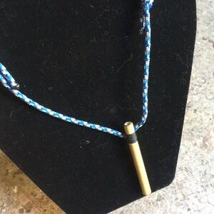 “Just Breathe” necklace.